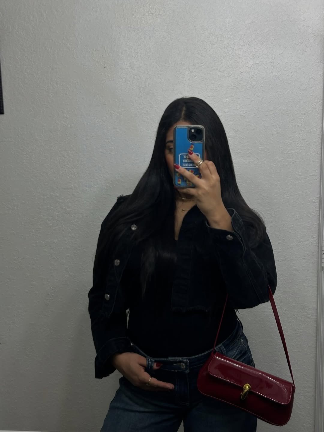 Mirror shot with a red bag